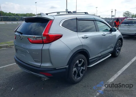 2017 Honda Cr-V Touring z USA, uszkodzony, nr VIN 2HKRW2H96HH612528